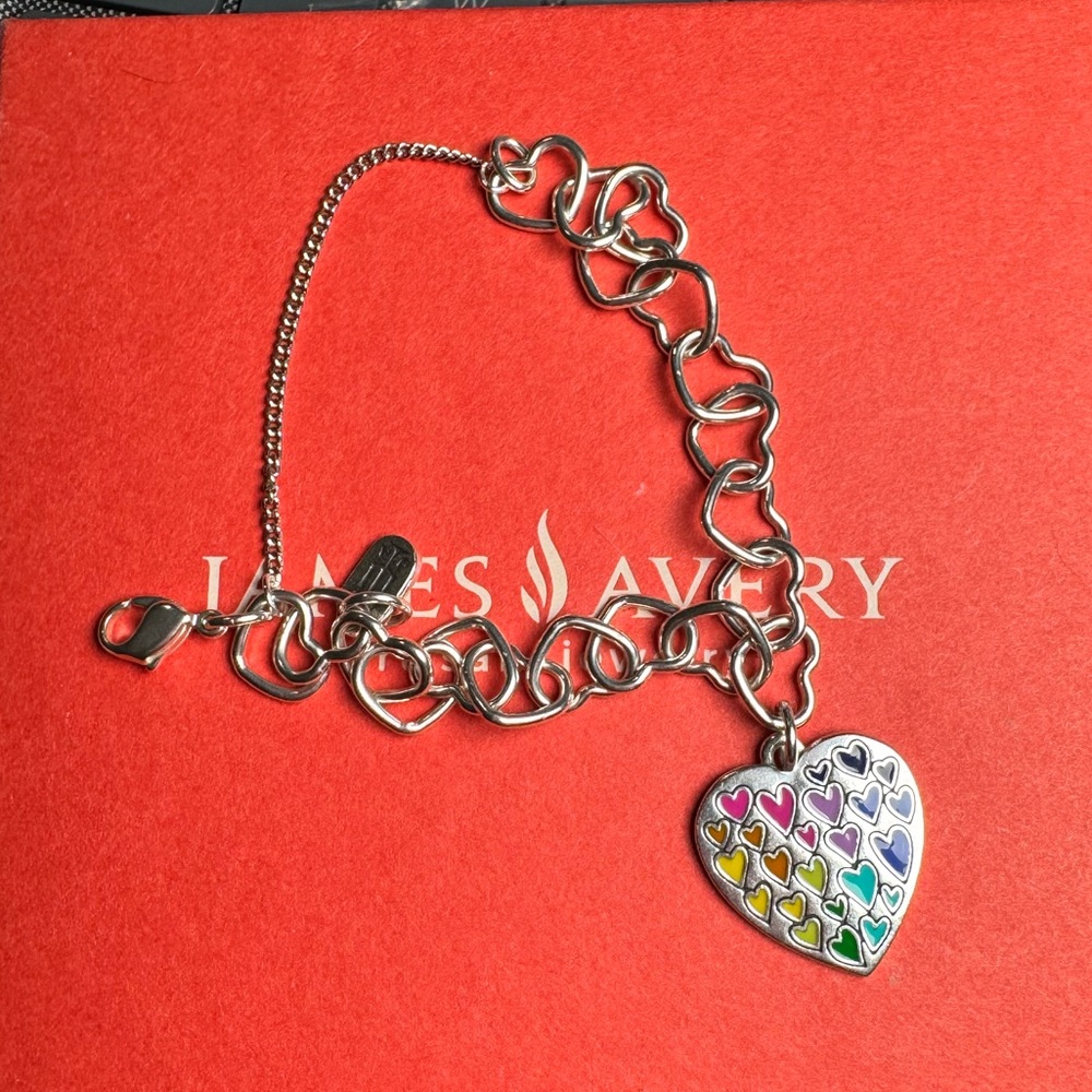 Connected Hearts Charm bracelet with full of love enamel heart charm.